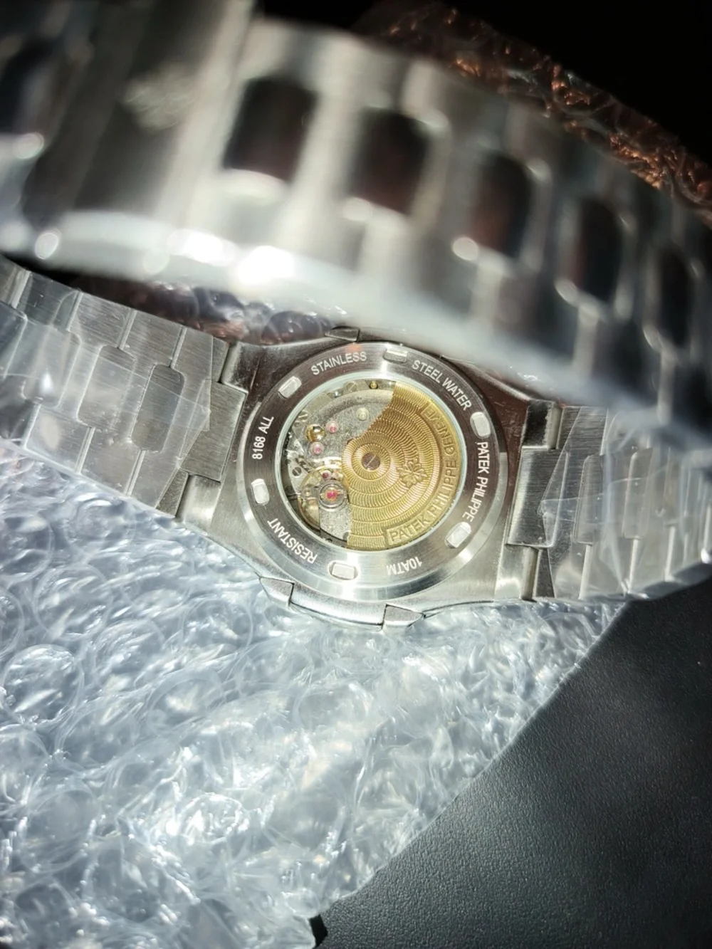 Black Dial Stainless Steel Watch with Red Gem Bezel
